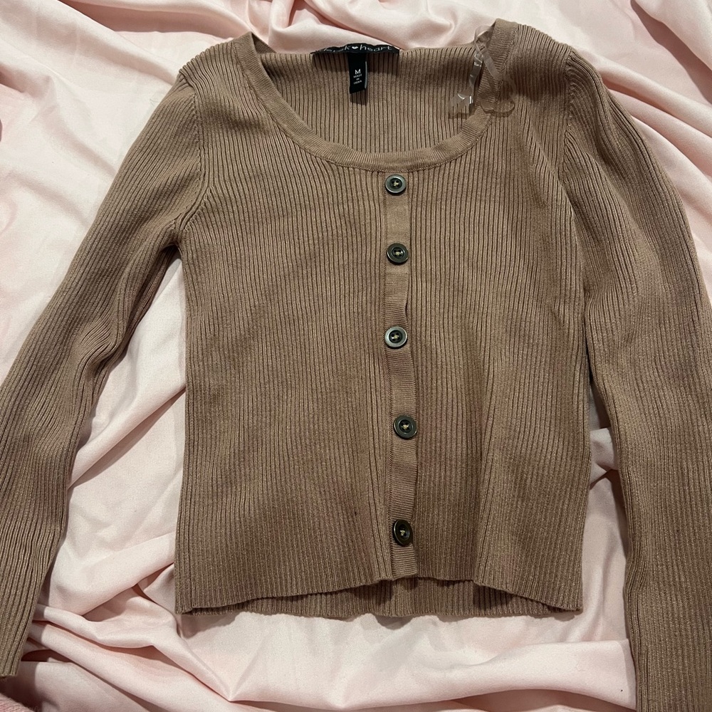 brown button down shirt